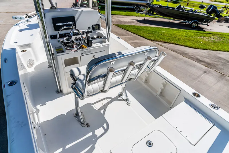 Slide: The Image of The image shows the cockpit of a 2016 Sea Hunt BX 20 BR boat with a helm and seating. - 7