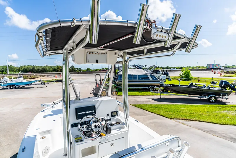 Slide: The Image of The image shows a 2016 Sea Hunt BX 20 BR boat with a modern helm station. - 6
