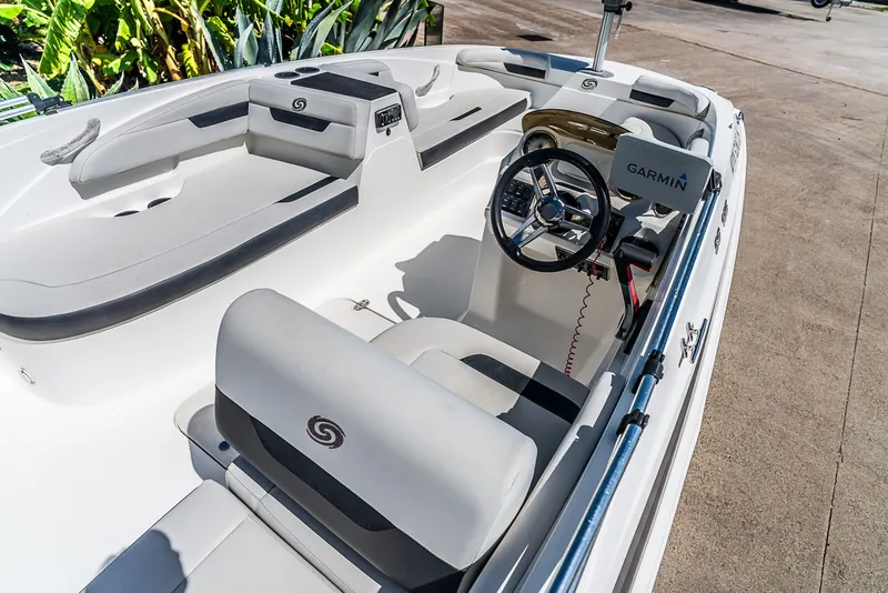 Slide: The Image of The image shows the cockpit of a 2020 Hurricane SS185 boat with a Garmin system. - 9