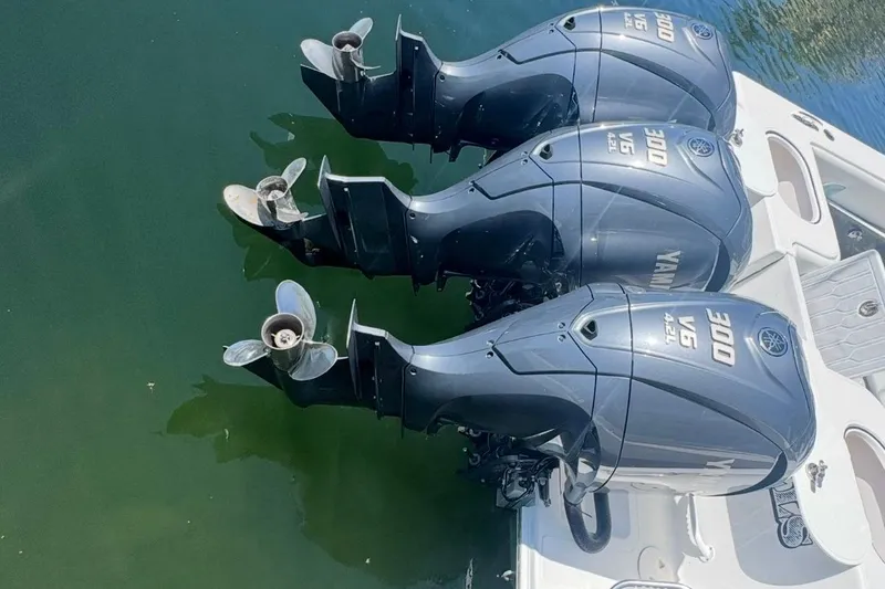 Slide: The Image of Triple Yamaha 300 V6 outboard engines on a 2017 SeaHunter 35 Tournament boat. - 21