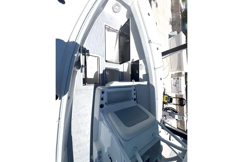 Slide: The Image of 2017 SeaHunter 35 Tournament boat interior with open storage compartments. - 28