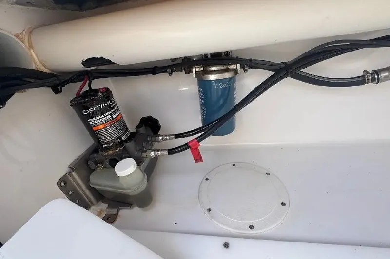 Slide: The Image of 2017 SeaHunter 35 Tournament boat engine compartment with Optimus steering system. - 31