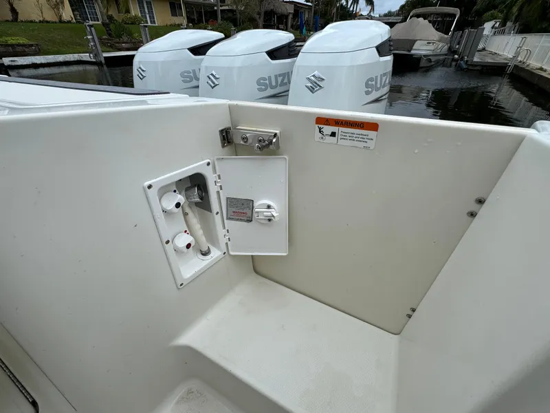 Slide: The Image of Hydra-Sports 3500 VX 2010 with Suzuki engines at dock. - 28