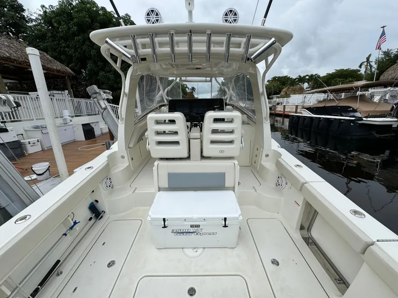 Slide: The Image of Hydra-Sports 3500 VX 2010 boat at dock, interior view. - 45