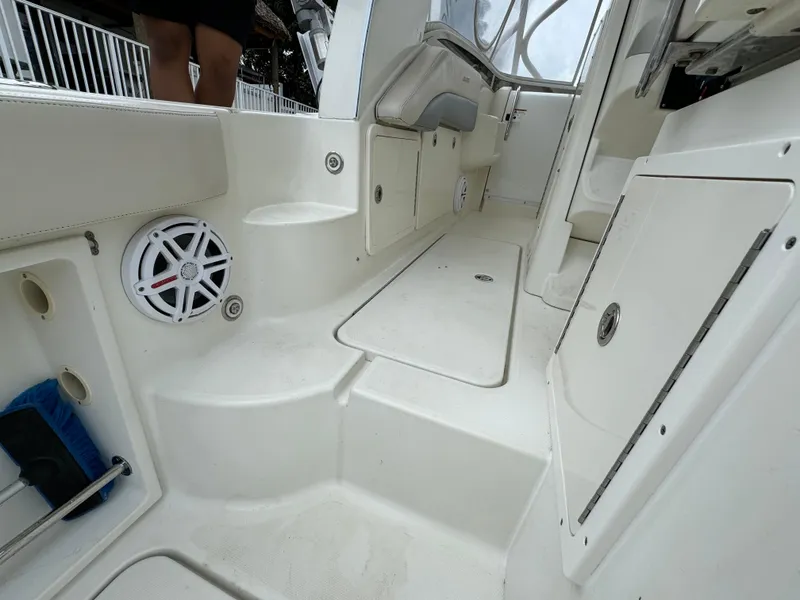 Slide: The Image of Interior of a 2010 Hydra-Sports 3500 VX boat, white fittings. - 47