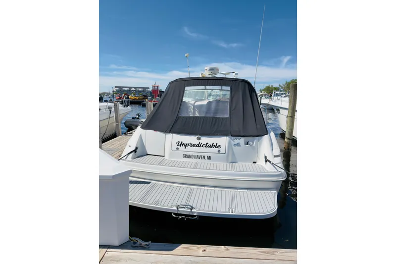Slide: The Image of 1995 Sea Ray Sundancer 370 docked, rear view with black cover, Grand Haven, MI. - 23