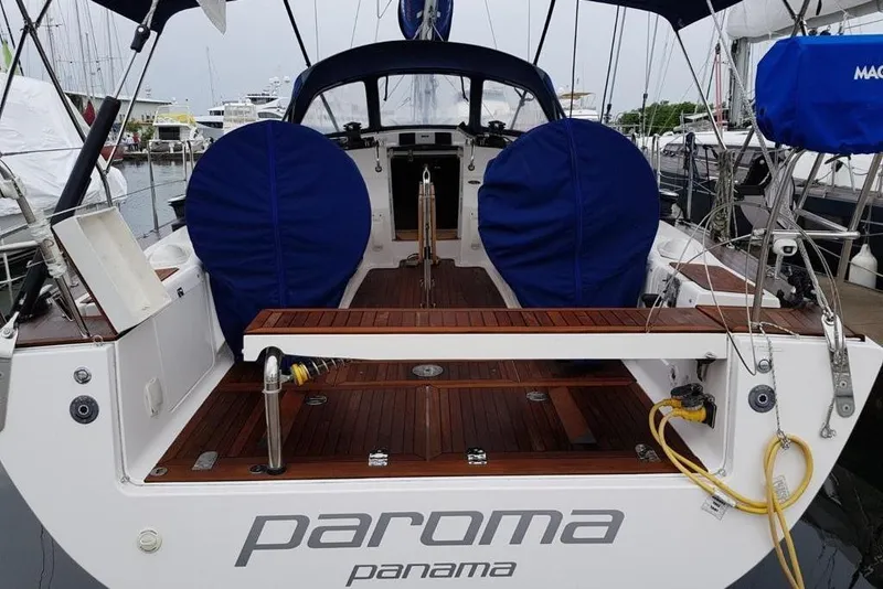 Slide: The Image of Sailing yacht Salona 44, 2015 model, docked with covered wheels and teak deck. - 3