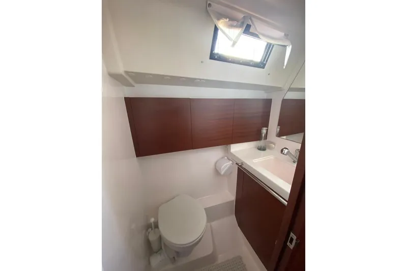 Slide: The Image of Modern bathroom interior of 2015 Salona 44 yacht with wooden cabinets and skylight. - 10