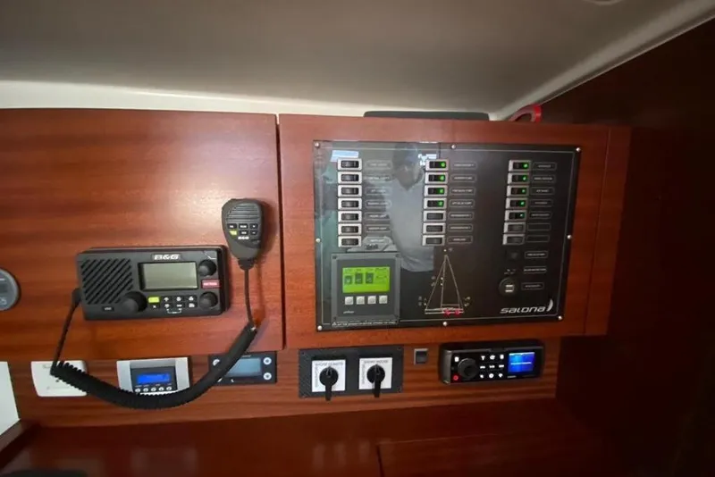 Slide: The Image of Control panel of a 2015 Salona 44 yacht with navigation and communication equipment. - 4