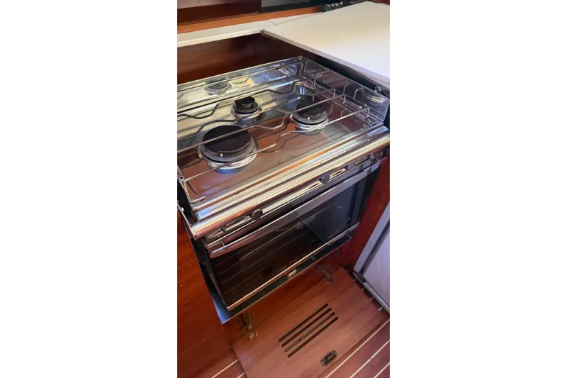 Slide: The Image of Stainless steel stove and oven in 2015 Salona 44 yacht kitchen. - 19