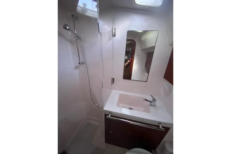Slide: The Image of Bathroom interior of 2015 Salona 44 yacht with shower, sink, and mirror. - 8