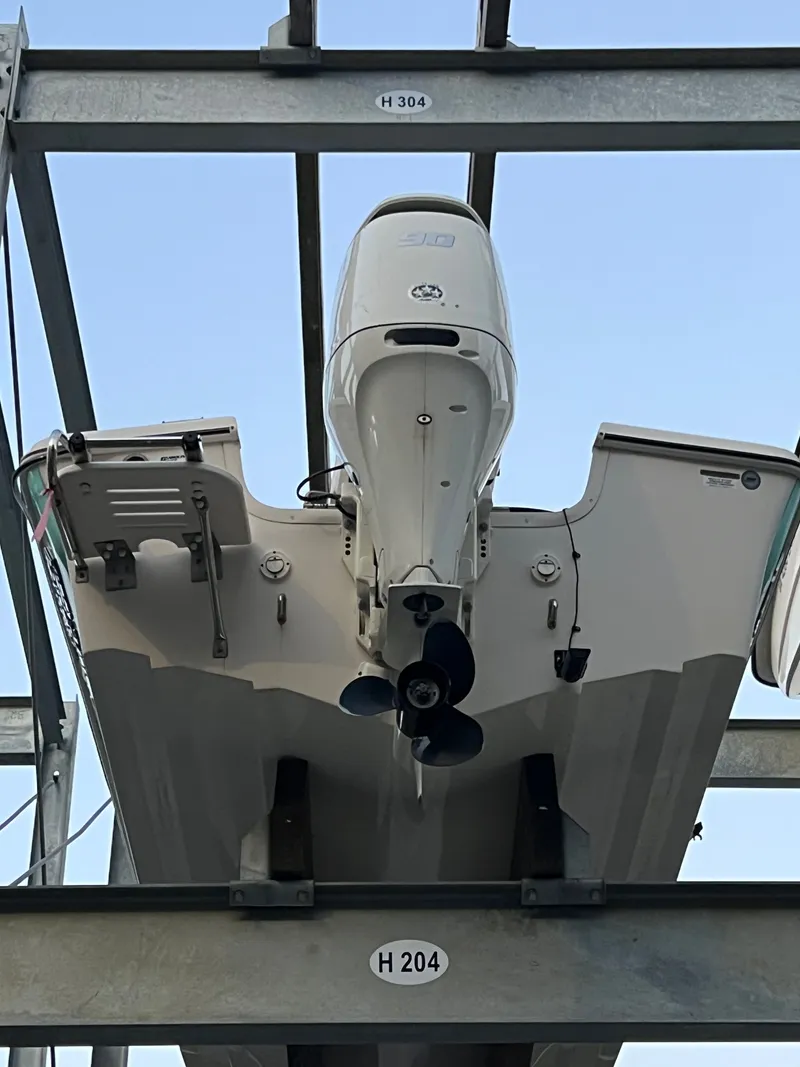 Slide: The Image of 2020 Carolina Skiff 192 CC on a boat rack. - 2