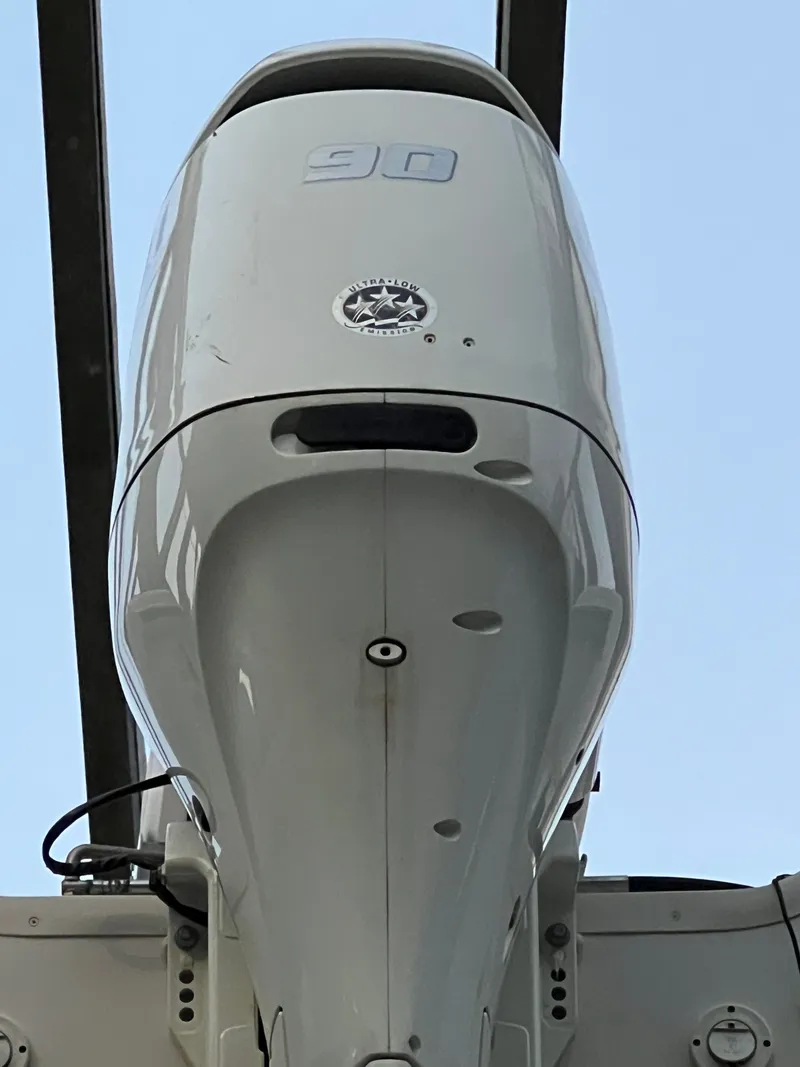 Slide: The Image of Close-up of an outboard motor on a Carolina Skiff 192 CC boat. - 3
