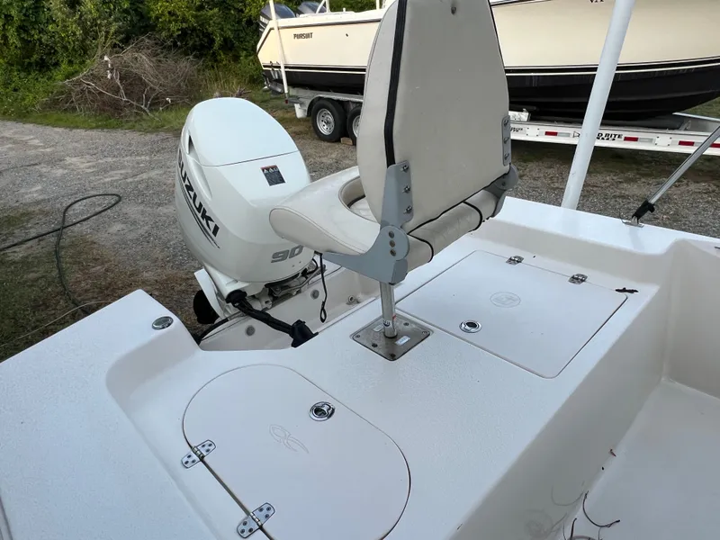 Slide: The Image of A Carolina Skiff 192 JLS boat with a Suzuki 90 HP outboard motor. - 8