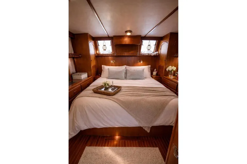 Slide: The Image of Cozy bedroom interior of 1987 Fair Weather Mariner 38 yacht with elegant wood finish. - 26