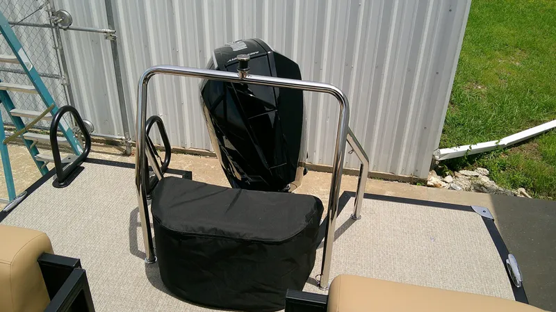 Slide: The Image of Evotti 525 QL boat motor, 2026 model, on a trailer. - 16
