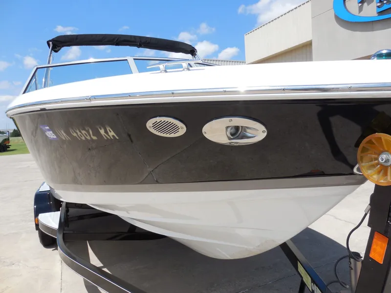 Slide: The Image of 2011 Cobalt 200 boat on a trailer, close-up view. - 10