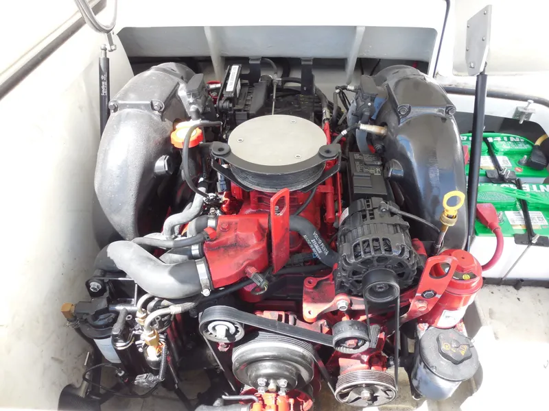 Slide: The Image of Engine of a 2011 Cobalt 200 boat, close-up view. - 25