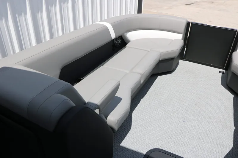 Slide: The Image of Interior of 2026 Evotti 525 CS Tri Toon with gray seating. - 31