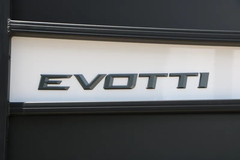 Slide: The Image of Evotti 525 CS Tri Toon 2026 logo on white background. - 9