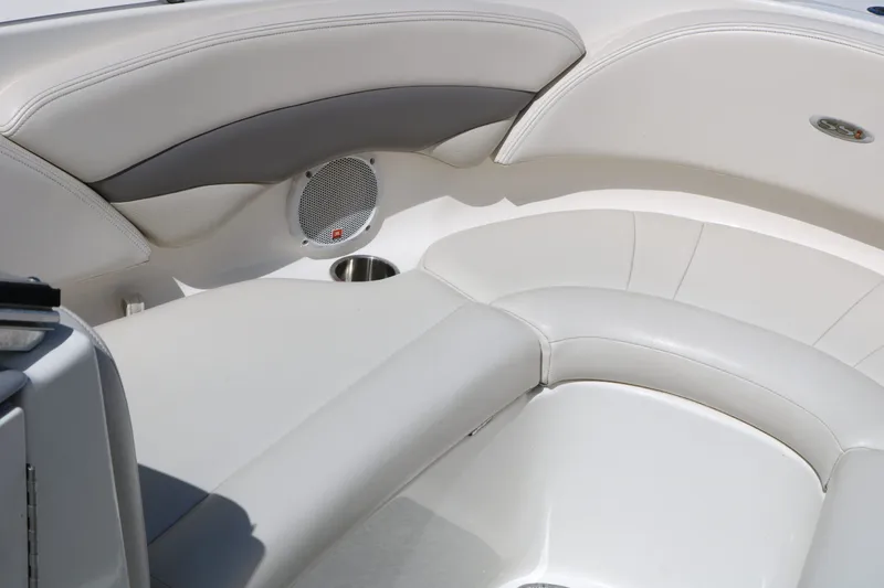 Slide: The Image of Interior of a 2005 Chaparral 220 SSi boat with gray upholstery. - 25