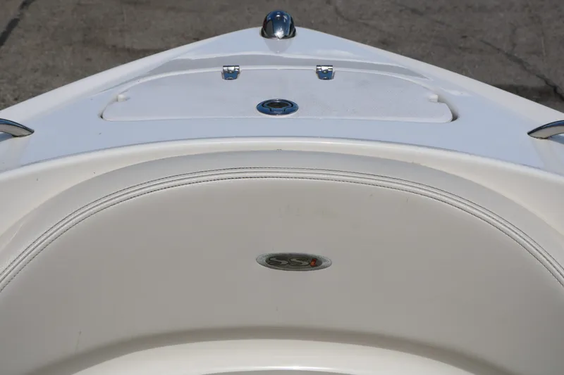 Slide: The Image of Bow of a 2005 Chaparral 220 SSi boat on concrete. - 27