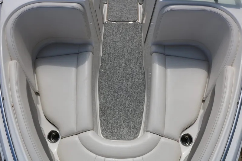 Slide: The Image of Interior of a 2005 Chaparral 220 SSi boat with gray carpet. - 34