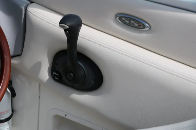 Slide: The Image of Close-up of throttle lever on 2005 Chaparral 220 SSi boat. - 36