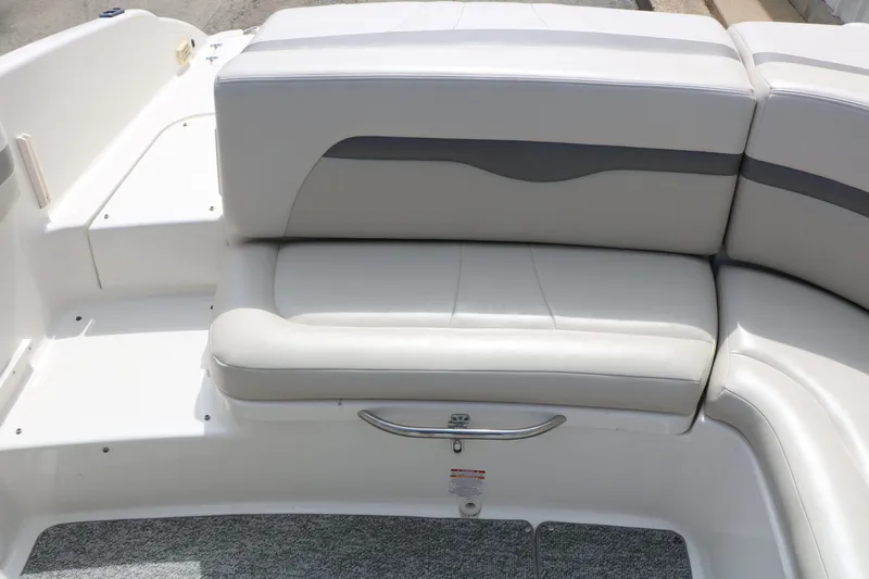 Slide: The Image of Interior of a 2005 Chaparral 220 SSi boat with seating area. - 38