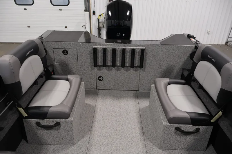 Slide: The Image of Interior of 2026 Crestliner 1850 Commander boat with seating and storage compartments. - 24