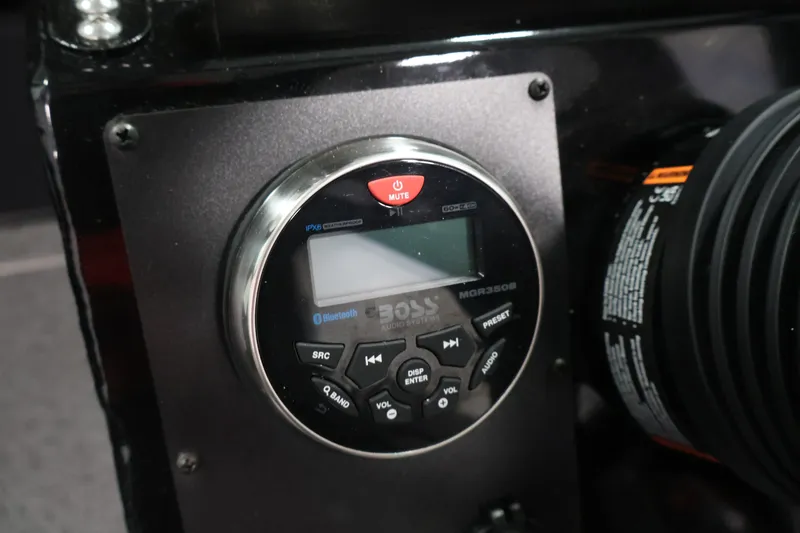 Slide: The Image of Close-up of a Boss audio system in a 2026 Crestliner 1850 Commander boat. - 15