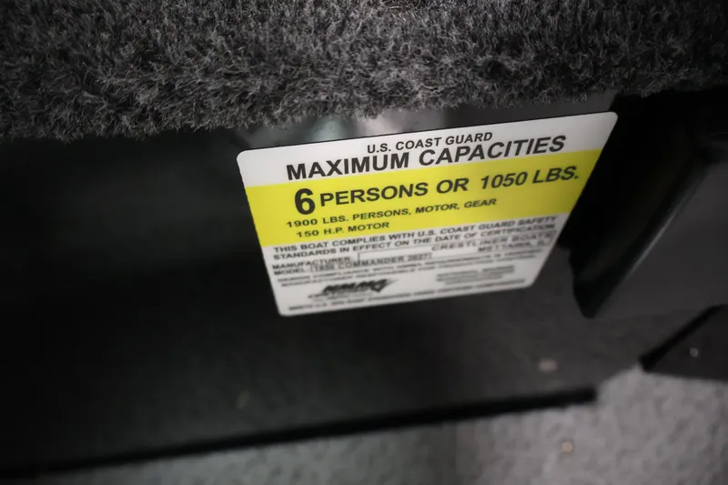 Slide: The Image of Capacity label on 2026 Crestliner 1850 Commander: 6 persons or 1050 lbs. - 18