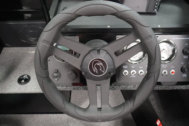 Slide: The Image of Steering wheel and dashboard of 2026 Crestliner 1850 Commander boat. - 13