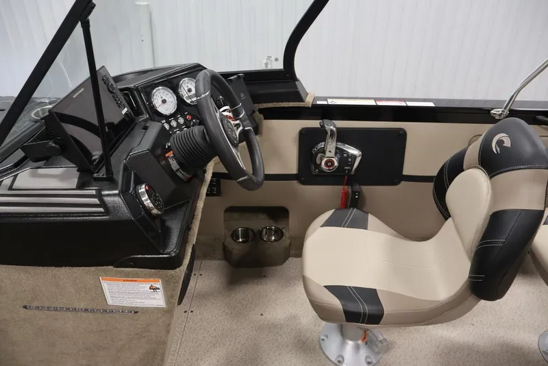 Slide: The Image of Interior of 2026 Crestliner 2050 Sportfish boat with steering wheel and control panel. - 52