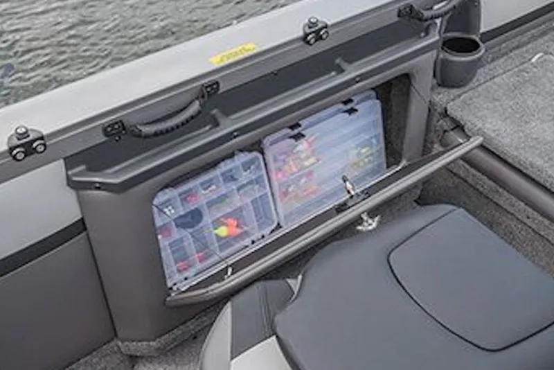 Slide: The Image of Storage compartment on 2026 Crestliner 2050 Sportfish boat with organized tackle boxes. - 4