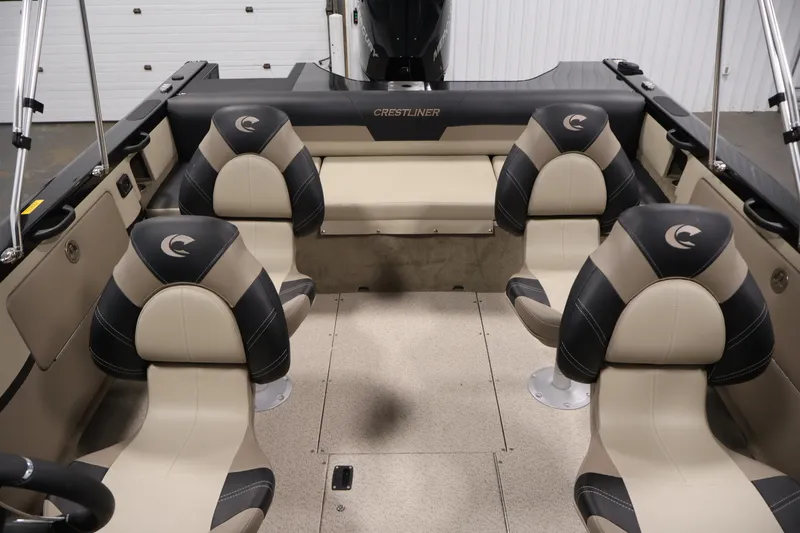 Slide: The Image of Interior of 2026 Crestliner 2050 Sportfish boat with stylish seating arrangement. - 26