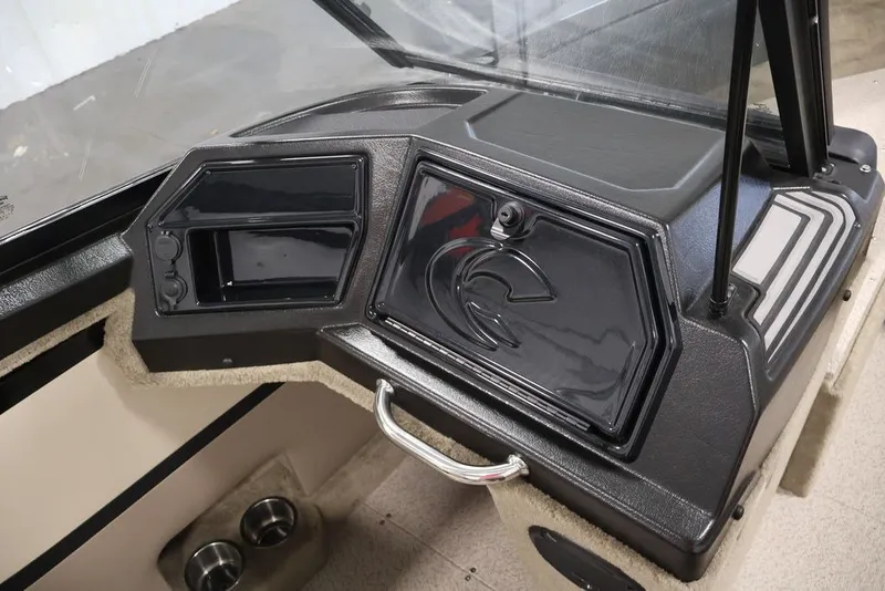 Slide: The Image of 2026 Crestliner 2050 Sportfish dashboard with storage compartment and sleek design. - 24