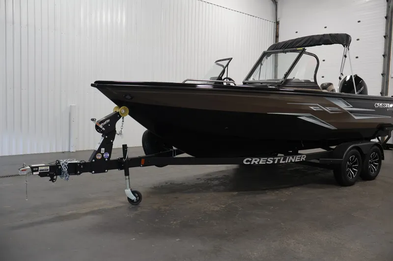 Slide: The Image of 2026 Crestliner 2050 Sportfish boat on trailer in indoor setting. - 40