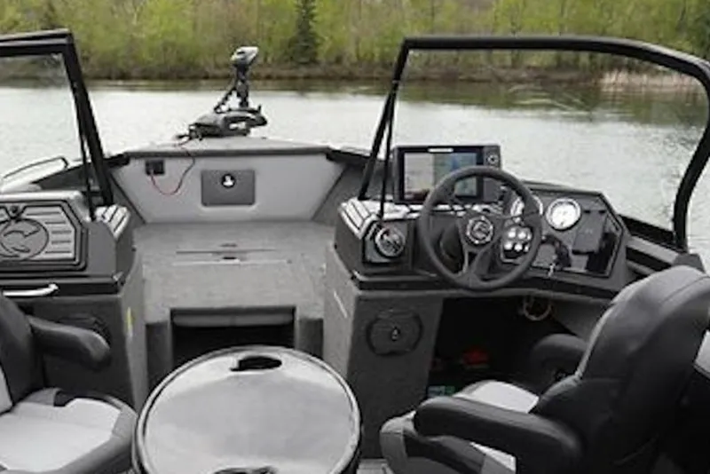 Slide: The Image of Interior view of 2026 Crestliner 2050 Sportfish boat with modern dashboard and seating. - 3