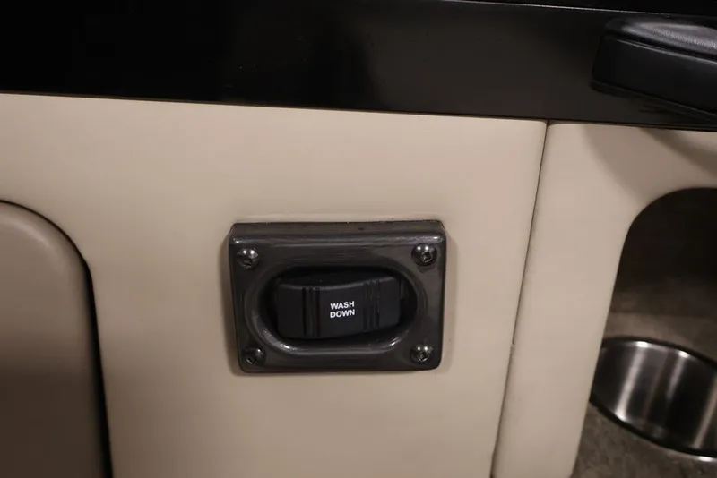 Slide: The Image of Wash down switch on 2026 Crestliner 2050 Sportfish boat interior panel. - 35