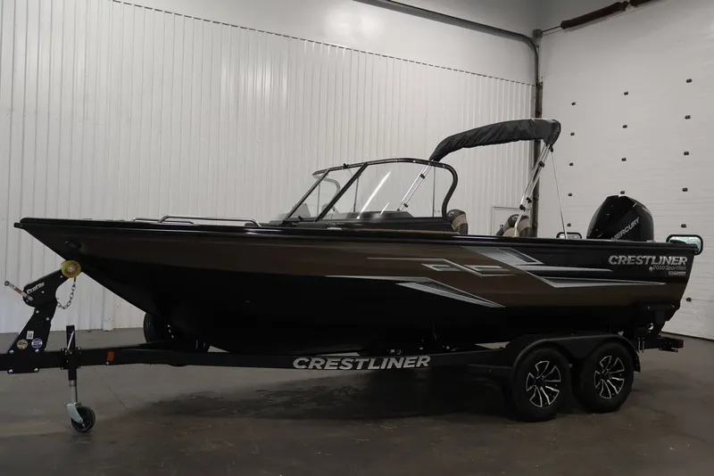Slide: The Image of 2026 Crestliner 2050 Sportfish boat on trailer in indoor setting. - 10