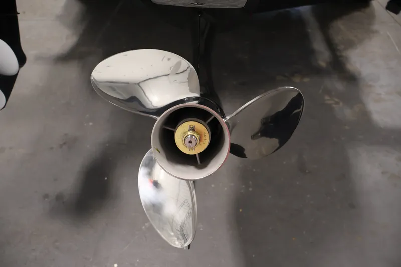 Slide: The Image of Propeller of 2026 Crestliner 2050 Commander boat, showcasing shiny metal blades. - 31