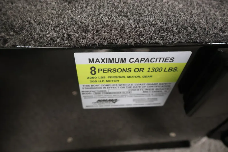 Slide: The Image of Maximum capacity label on 2026 Crestliner 2050 Commander boat, 8 persons or 1300 lbs. - 19