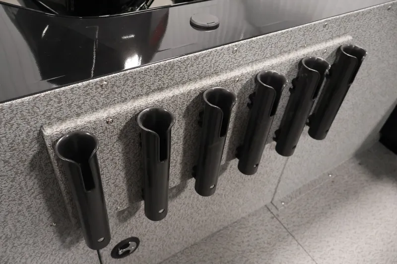 Slide: The Image of Rod holders on a 2026 Crestliner 2050 Commander boat, featuring a sleek, textured design. - 27
