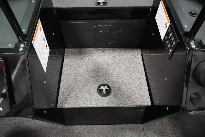Slide: The Image of Interior of 2026 Crestliner 2050 Commander boat, featuring durable flooring and control panels. - 10