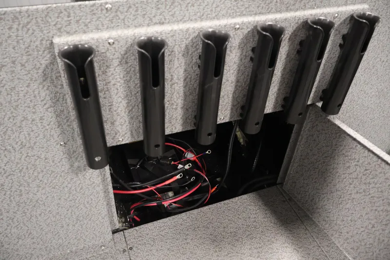 Slide: The Image of Rod holders and wiring inside a 2026 Crestliner 2050 Commander boat. - 28