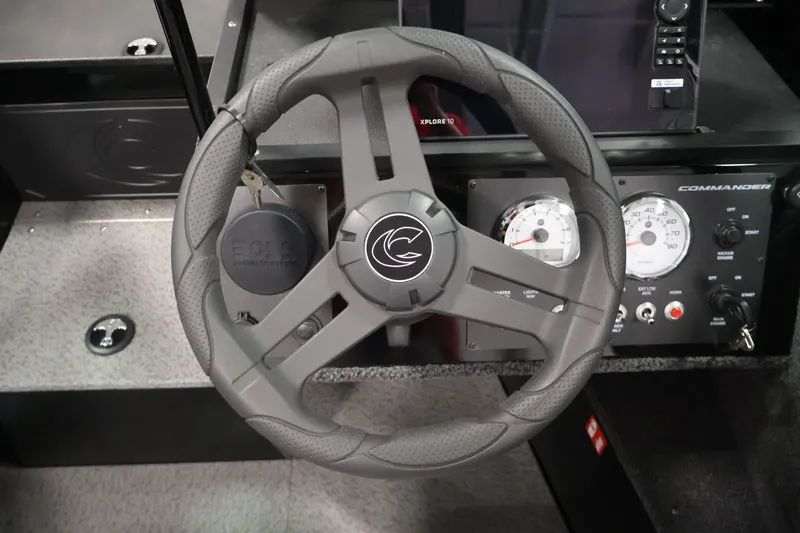 Slide: The Image of Steering wheel and dashboard of 2026 Crestliner 2050 Commander boat. - 14
