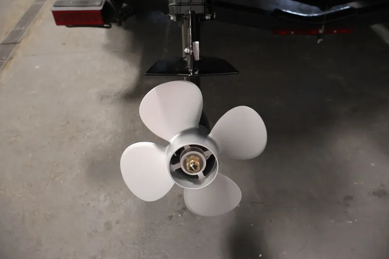 Slide: The Image of Propeller of 2026 Crestliner 2050 Commander boat in a garage setting. - 34