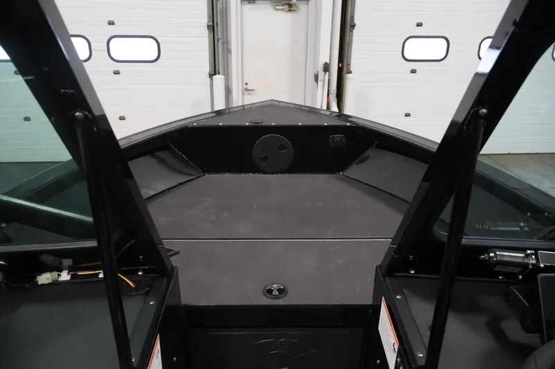 Slide: The Image of Interior view of 2026 Crestliner 2050 Commander boat, showcasing spacious deck and modern design. - 8