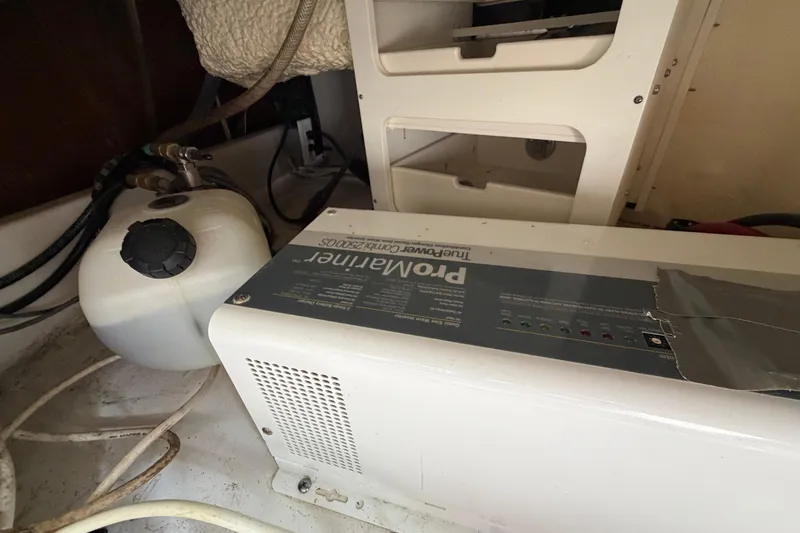 Slide: The Image of Electrical equipment and components inside a 2018 Sailfish 325 DC boat. - 23